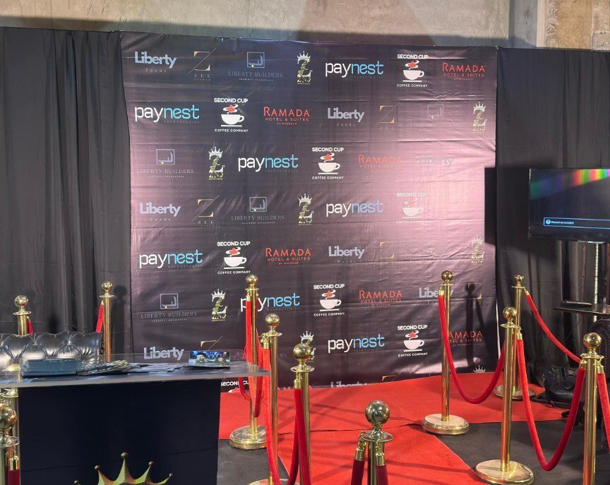 ZNJ reception desk and red-carpet setup at the Basant event